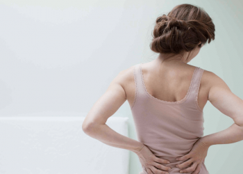 Чи прогрівати спину при болях?