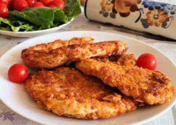 Курячі шніцелі в сирній паніровці